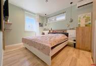 Moderne Dreizimmerwohnung mit Garten und zwei Parkplätzen, Badebiotop
