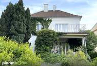 Charmantes Haus mit blühendem Garten in Top Lage