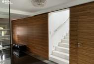 Luxuriöses Wohnen: Designhaus mit Garten, Pool und geräumiger Garage