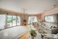 Beeindruckende Villa mit gepflegtem Garten und Pool als Investment