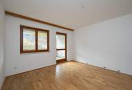 Gepflegte Wohnung mit Küche und Loggia und TG-Stellplatz in zentraler Lage!