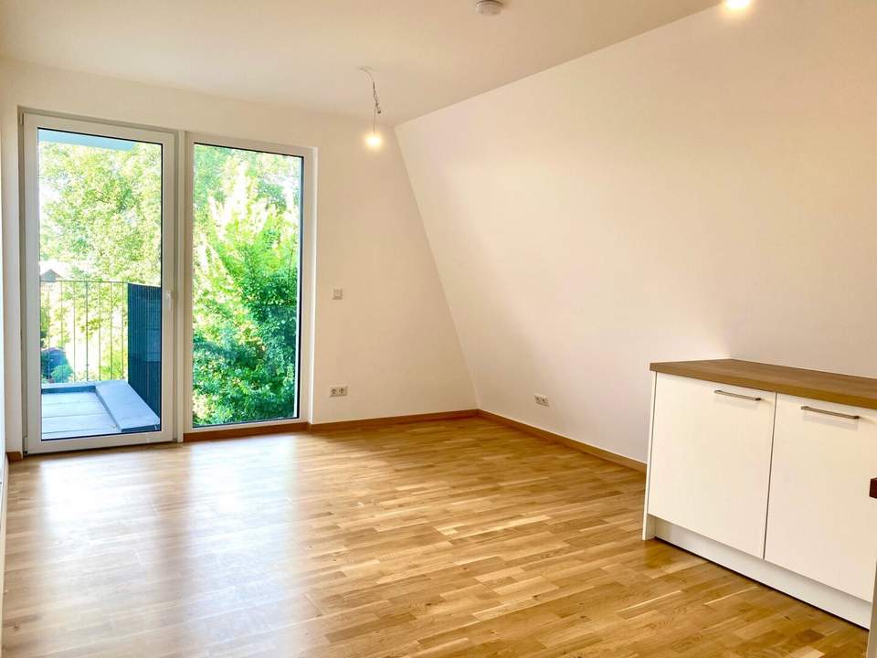 PERFEKTE 2-ZIMMER-WOHNUNG MIT GARAGE, BALKON UND KLIMAANLAGE NÄHE ALTE DONAU