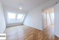 Helle 2-Zimmer-DG-Wohnung im jungen Neubau mit Westterrasse & Klimaanlage – nur 5 Min. Fußweg zur U6 - ab 1.11. / 1.12.26