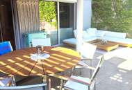 Exquisites Wohnen mit großzügiger Sonnen-Terrasse und Schwimmbiotop
