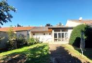 Solides Einfamilienhaus mit Garten und großer Halle