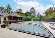 Modernes Mehrfamilienhaus mit Terrassen, Garage, Pool, Outdoorküche, Spielplatz uvm.