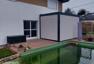 "Bereit für den Sommer im eigenen Haus mit Schwimmteich?"