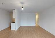 Sonnwendviertel: 1-Zimmer-Wohnung mit Balkon im 17. OG – Fitnessraum, Co-Working &amp; Rooftop-Terrasse inklusive!