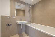 ERSTBEZUG | 2-Zimmer Neubau mit ca. 7 m² BALKON/TERRASSE | Fernwärme | TG-Stellplatz optional | Nachhaltiges Wohnbauprojekt