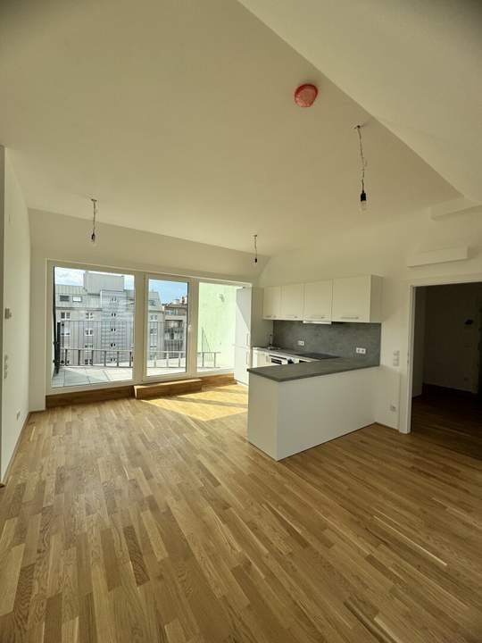 Wunderschöne 4 Zimmer Dachterrassenwohnung mit Garagenplatz in Top Lage