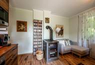 "Kaminfeuer trifft Gartentraum: Topmoderne Gartenwohnung im Wienerwald"