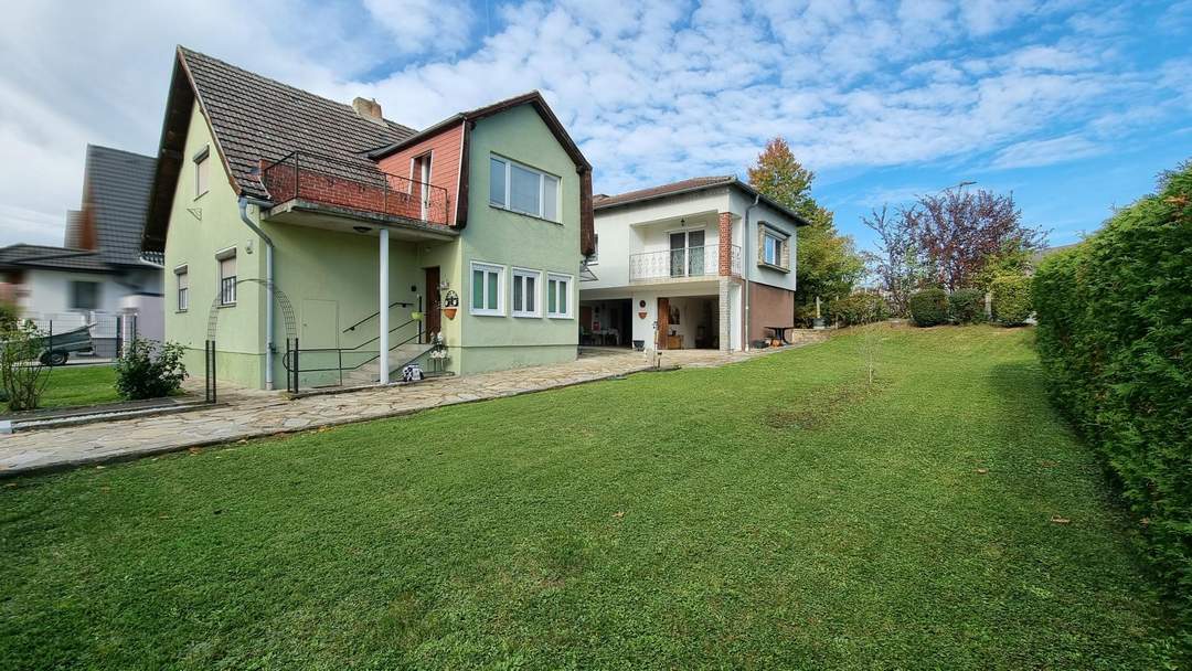 Vielseitiges Mehrfamilienhaus mit Charme und einladendem Garten