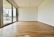Exklusive Neubauwohnung mit moderner Küche, 37 m² Balkon und TG-Stellplatz in sonniger Lage!