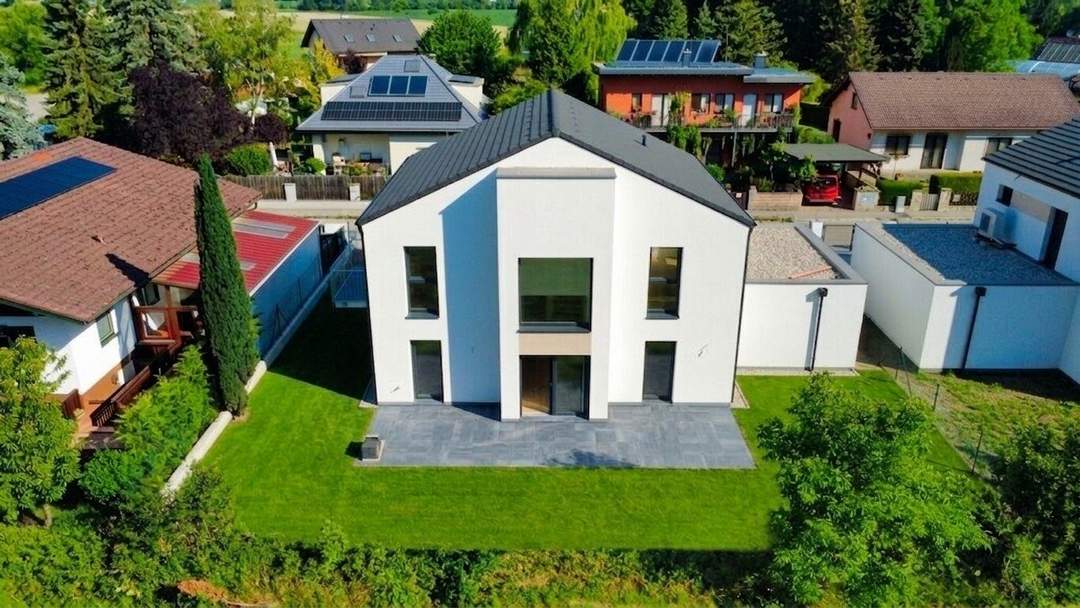 Exklusives 5-Zimmer-Einfamilienhaus mit Garage - Schlüsselfertig - Großzügige Wohnflächen trifft auf idyllischen Eigengarten - Wohnkomfort auf höchstem Niveau