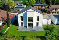 Exklusives 5-Zimmer-Einfamilienhaus mit Garage - Schlüsselfertig - Großzügige Wohnflächen trifft auf idyllischen Eigengarten - Wohnkomfort auf höchstem Niveau