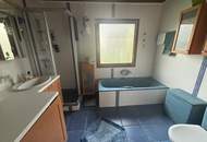 BUNGALOW mit Wintergarten und Garage!