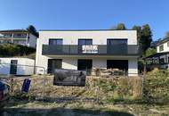 Modernes Zweifamilienhaus mit Gartenwohnungen – Erstbezug!