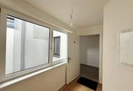 Eleganz trifft Lage – Neubau-Dachgeschosswohnung in Toplage