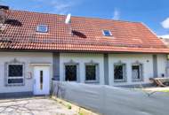 Wohnen im Zentrum samt Grünfläche: Einfamilienhaus mit Sanierungsbedarf