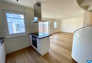 Wunderschöne Dachgeschosswohnung mit großer Terrasse und Wintergarten!