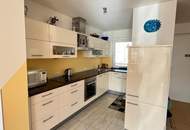 Lichtdurchflutetes Wohnjuwel mit verglaster Loggia in zentraler Lage von Götzens