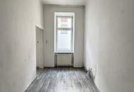 Altbauwohnung mit Entwicklungspotenzial in urbaner Ruhelage