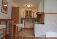 Möblierte 2-Zimmer-Wohnung mit Balkon, Grünblick und Tiefgarage in absoluter Ruhelage