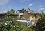 Solides Ein- oder Zweifamilienhaus auf tollem Grund!
