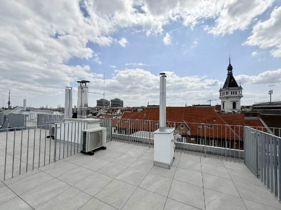 Eleganz trifft Lage – Neubau-Dachgeschosswohnung in Toplage