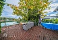 Elegantes Einfamilienhaus am See mit großzügiger Terrasse und Garten
