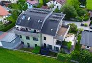 Neuwertige Familienwohnung mit Reihenhauscharakter
