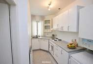 Charmante Dachgeschosswohnung mit Balkon und Lift in ausgezeichneter Lage