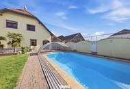 Energieeffizientes, großzügiges Einfamilienhaus mit Pool, sonnigem Garten und beheiztem Wintergarten!