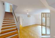 Elegante Dachgeschosswohnung mit Gartenblick, Terrassen und Garage