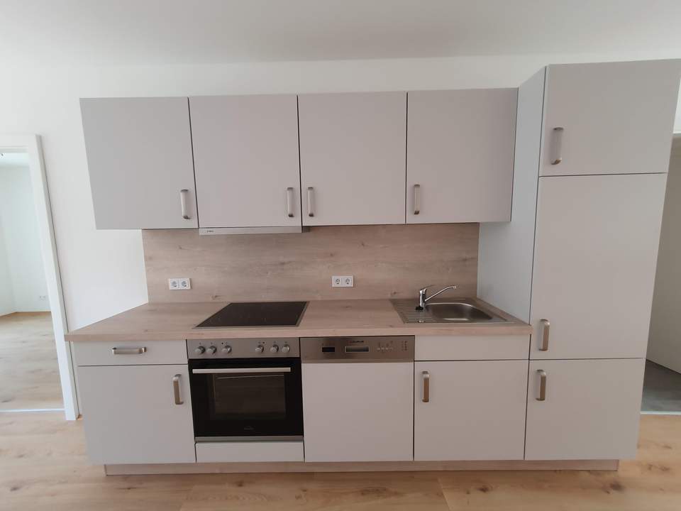 Geförderte Neubauwohnung mit Balkon im 1. Stock