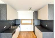 Traumlage bei der UNO-City – moderne Wohnung mit Loggia