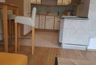Möblierte 2-Zimmer-Wohnung mit Balkon, Grünblick und Tiefgarage in absoluter Ruhelage