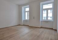 Moderne 3-Zimmer-Wohnung mit charmantem Wintergarten in traumhafter Liegenschaft!