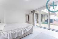 Moderne Erdgeschosswohnung mit Garten und Dachterrasse