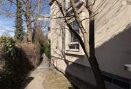 4-Zimmer-Terrassenwohnung mit ca. 100m² Garten und TG Stellplatz