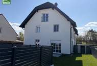 Elegant Wohnen im Grünen! Großzügige Doppelhaushälfte mit Terrassen, Garten und 2 Parkplätzen.