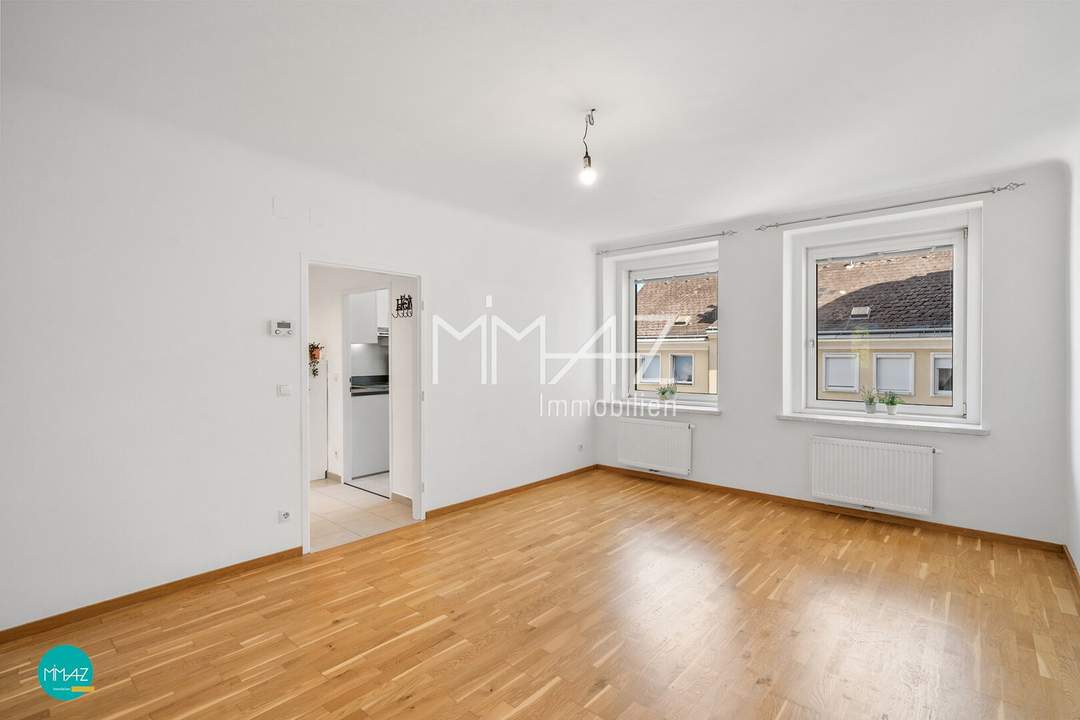 Liesing Bestlage! Gut geschnitten - Perfekt angebunden! Helle 2-Zimmer Wohnung mit sehr großem Gemeinschaftsgarten