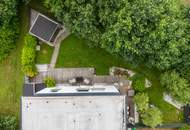 Zuhause im Grünen – Lichtdurchflutete Maisonette mit Gartenoase und Wasserblick