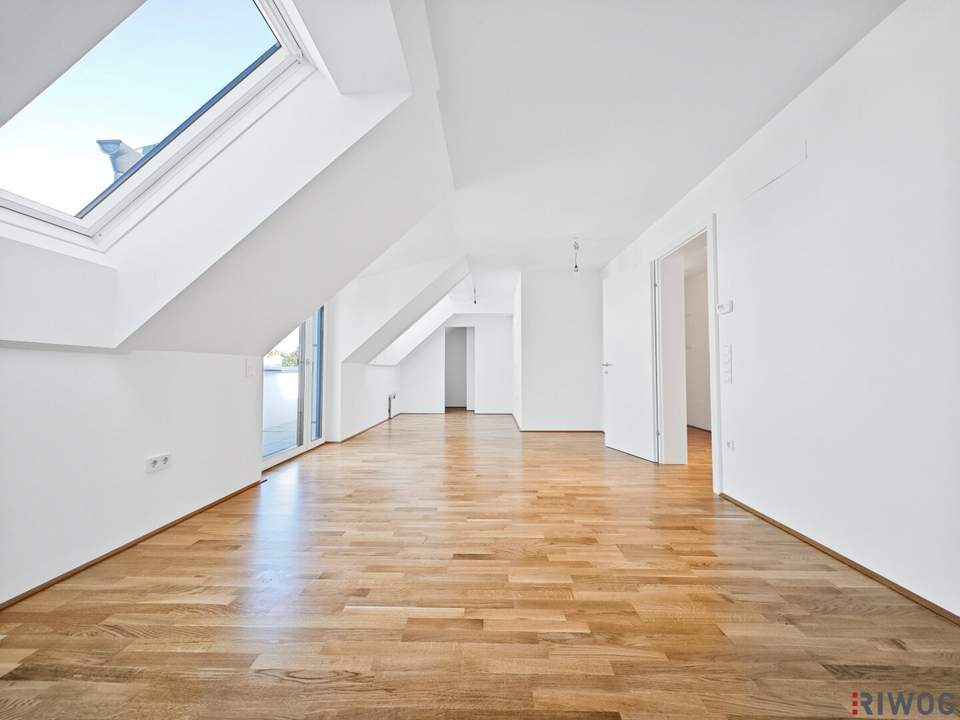 Erstbezug nach Errichtung | 3-Zimmer Dachgeschosswohnung mit Balkon in ruhigen Innenhof | PKW-Abstellplatz | fertiggestellt & bezugsbereit