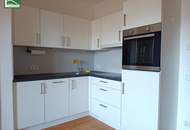 Grünblick mitten in der Stadt: 2-Zimmer-Neubauwohnung in Hofruhelage