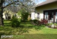 Ebenerdiges Wohnhaus inklusive Einliegerwohnung und romantischem Bauerngarten!