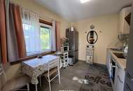 Kompakter, teilsanierter Bungalow in ruhiger Ortsrandlage - eigenes Grundstück!