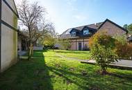 Reizende 3-Zimmer-Wohnung mit 2 Balkonen, gartenseitiger Veranda und Garagenplatz