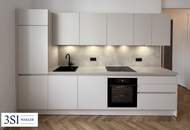 Wohnen beim Schloss Belvedere: Erstbezug mit Grünblick in Hofruhelage