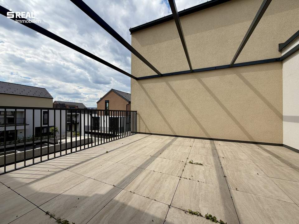 moderner Erstbezug mit großzügiger Südterrasse – ideal für Singles